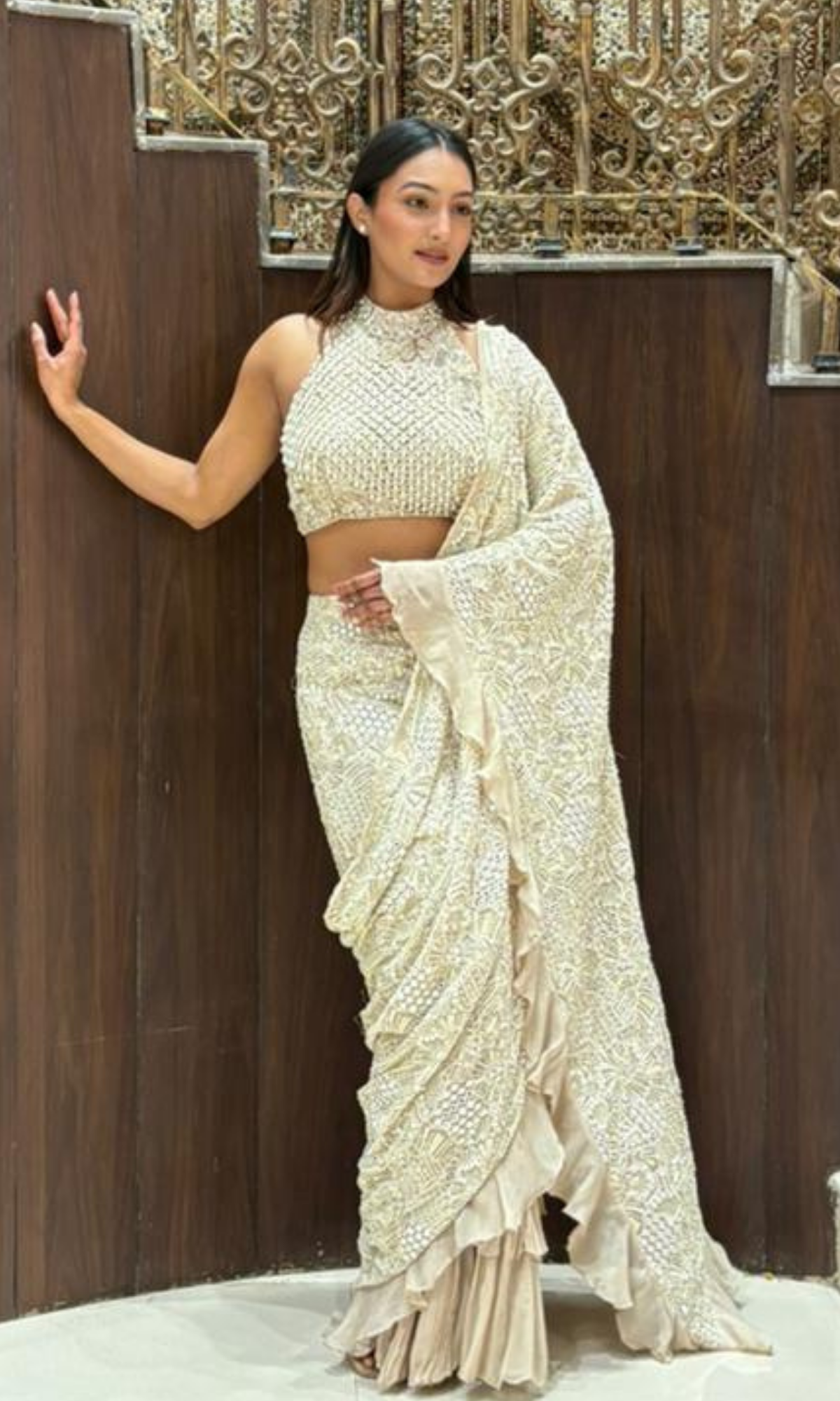 Cream embellished Saree with halter blouse