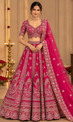 Rani Pink Bridal Lehenga with Intricate Embroidery & Embellished Dupatta
