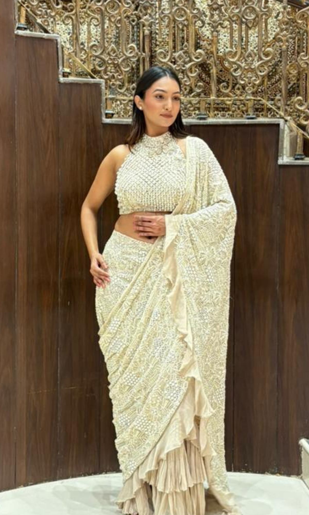 Cream embellished Saree with halter blouse