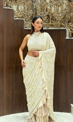 Cream embellished Saree with halter blouse