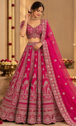 Rani Pink Bridal Lehenga with Intricate Embroidery & Embellished Dupatta