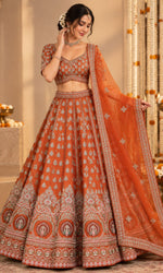 Orange Bridal Lehenga with Silver Embroidery & Embellished Dupatta