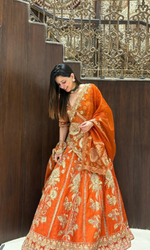 Orange Embriodered Lehenga With stitched blouse