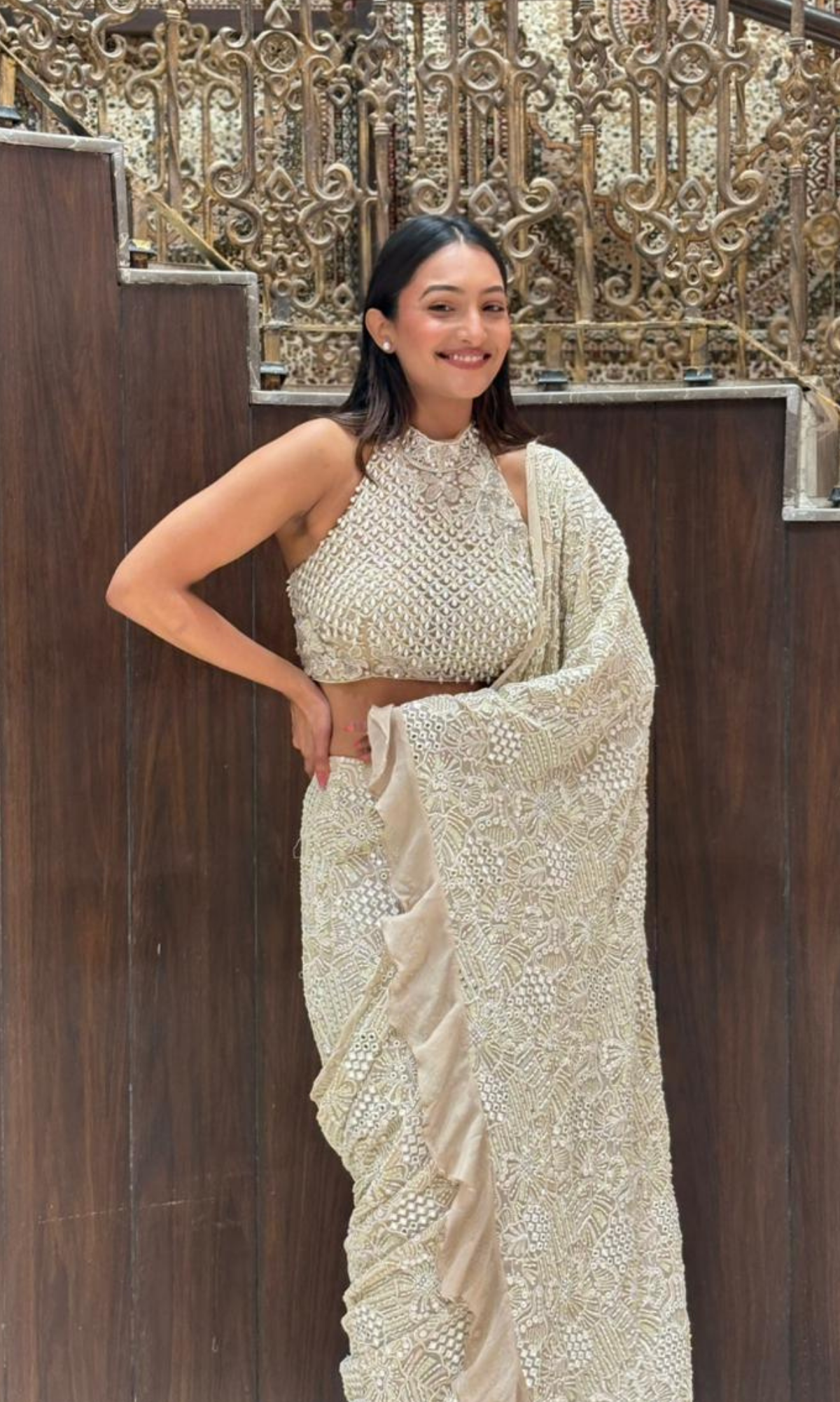 Cream embellished Saree with halter blouse