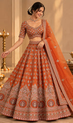 Orange Bridal Lehenga with Silver Embroidery & Embellished Dupatta
